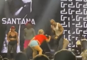 Léo Santana tira mulher do palco após gesto obsceno e pede respeito a esposa