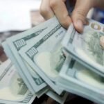 Dólar fecha cotado a R$ 5,09 e bolsa recua em dia de cautela